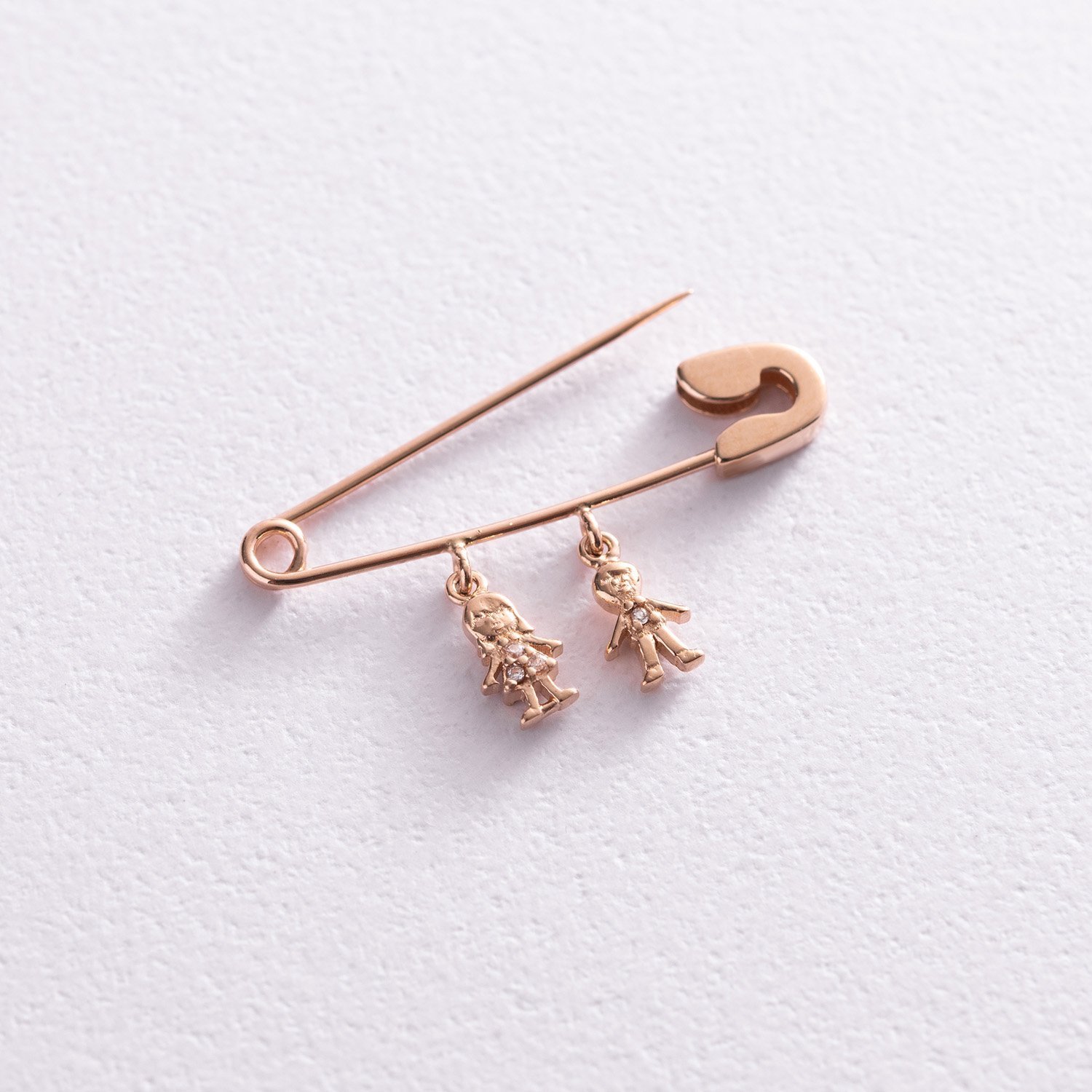 Золота шпилька Хлопчик і дівчинка (фіаніти) зак00322 Онікс